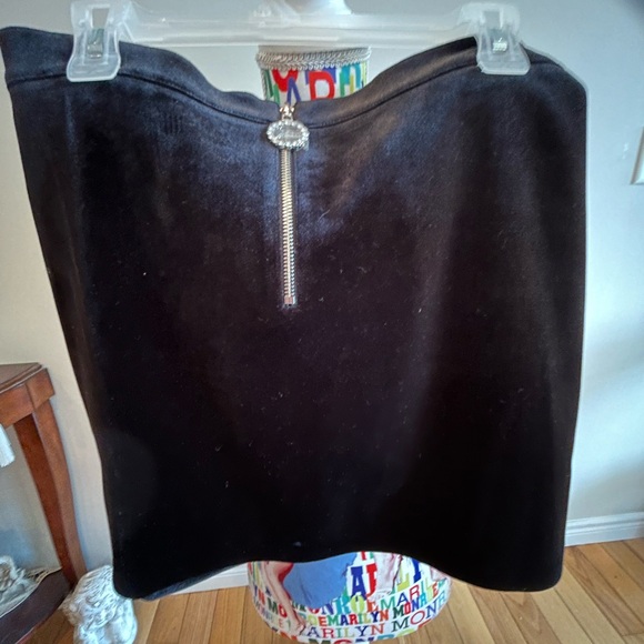 Women’s black velvet skirt new without tags. Zippered back. Plastic still on pul - Picture 2 of 4